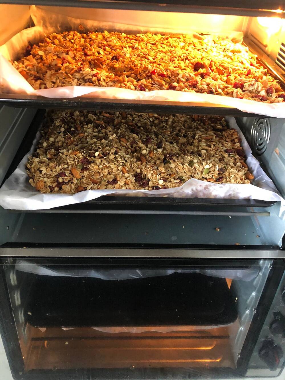The first LoveArth granola batches baking in Rohit's home oven